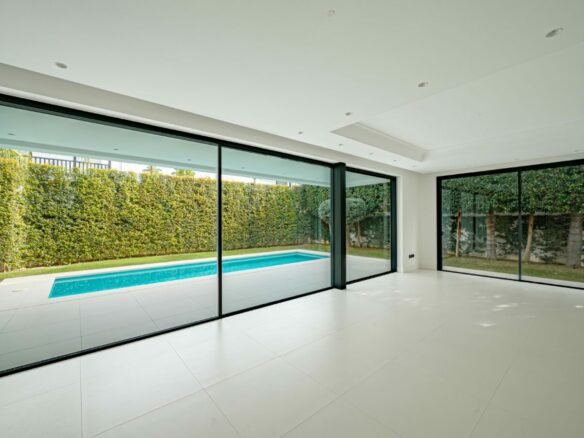 🏡✨ FOR SALE: Modern Villa on the Golden Mile – Beachside Paradise 🌊☀️