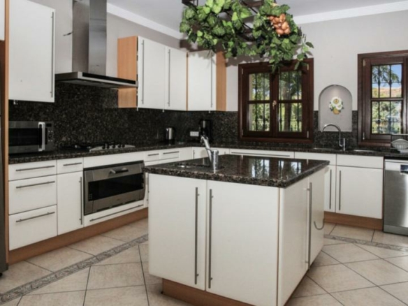 Andalusian style 8B  villa for sale in Los Flamingos, Benahavis.