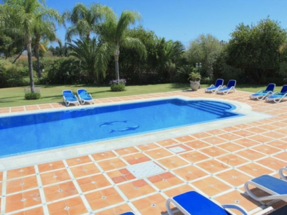 Andalusian style 8B  villa for sale in Los Flamingos, Benahavis.