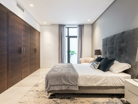 🌟 For Sale: Contemporary Beachside Villa on the Golden Mile! 🏡🌊