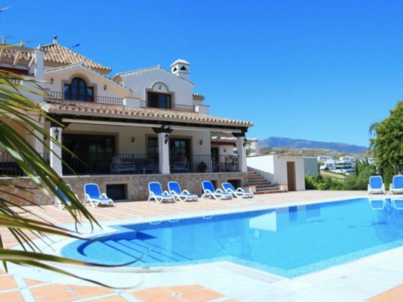 Andalusian style 8B  villa for sale in Los Flamingos, Benahavis.