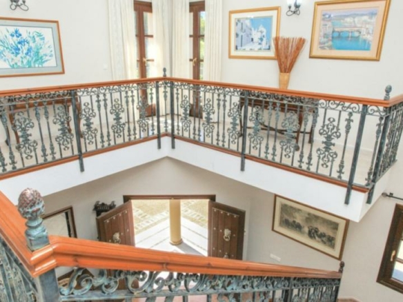 Andalusian style 8B  villa for sale in Los Flamingos, Benahavis.
