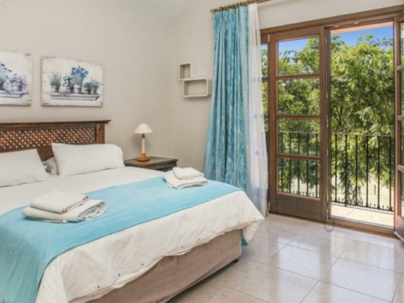 Andalusian style 8B  villa for sale in Los Flamingos, Benahavis.
