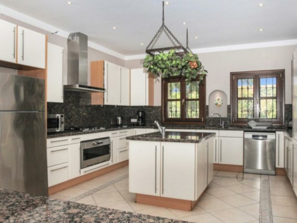 Andalusian style 8B  villa for sale in Los Flamingos, Benahavis.