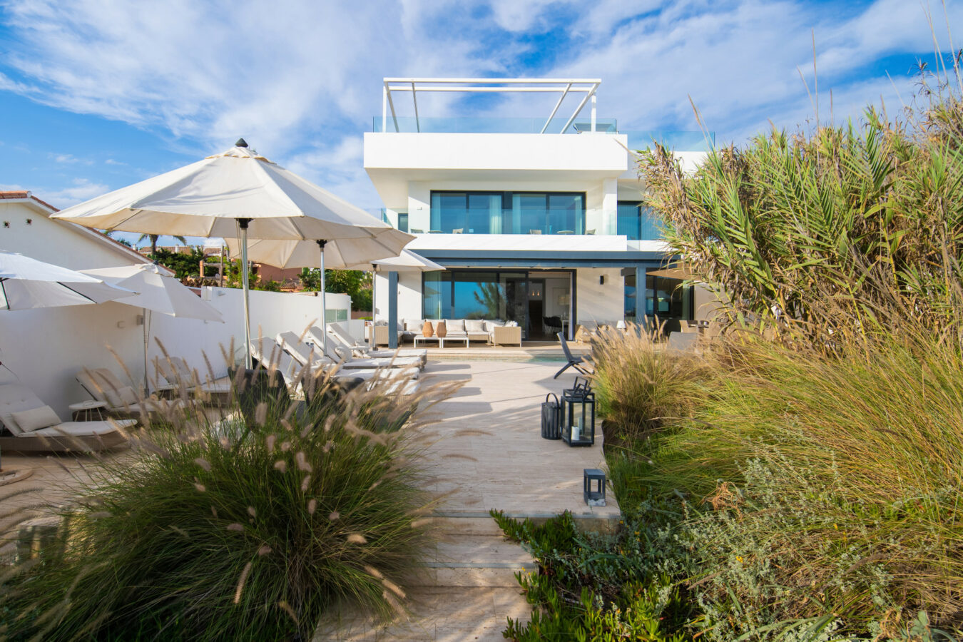 FOR SALE 🏡 Beachfront Villa with Direct Sand Access and Rooftop Wellness Deck – Costabella, Marbella