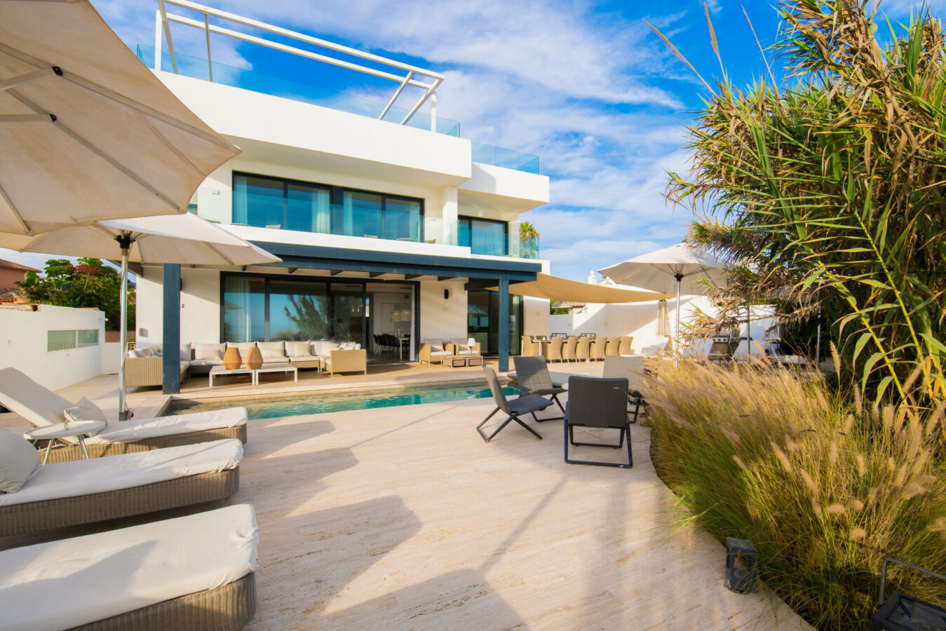 FOR SALE 🏡 Beachfront Villa with Direct Sand Access and Rooftop Wellness Deck – Costabella, Marbella