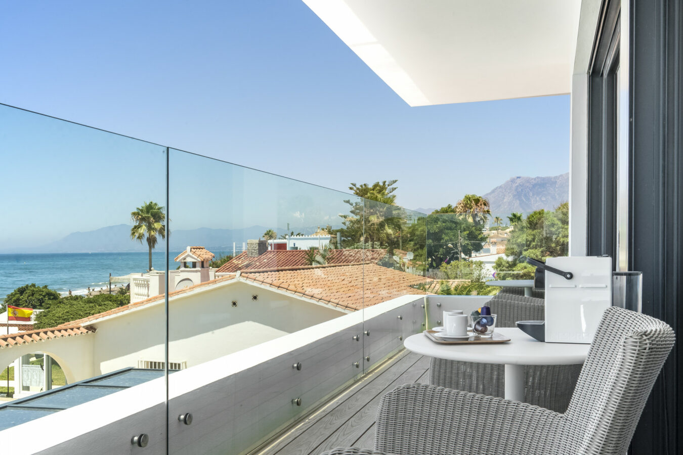 FOR SALE 🏡 Beachfront Villa with Direct Sand Access and Rooftop Wellness Deck – Costabella, Marbella