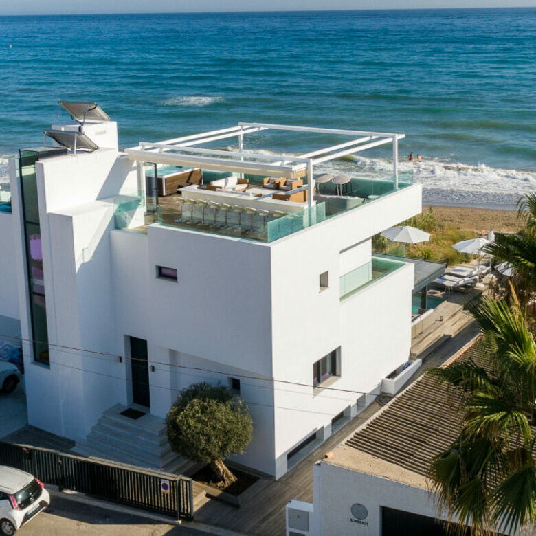 FOR SALE 🏡 Beachfront Villa with Direct Sand Access and Rooftop Wellness Deck – Costabella, Marbella