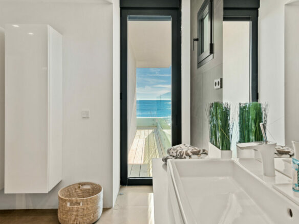 FOR SALE 🏡 Beachfront Villa with Direct Sand Access and Rooftop Wellness Deck – Costabella, Marbella