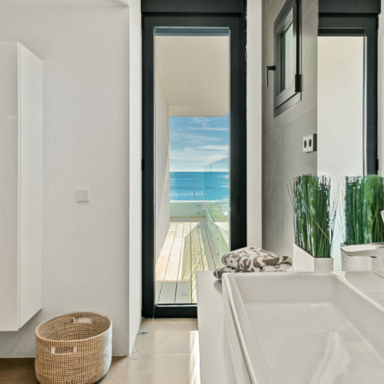 FOR SALE 🏡 Beachfront Villa with Direct Sand Access and Rooftop Wellness Deck – Costabella, Marbella