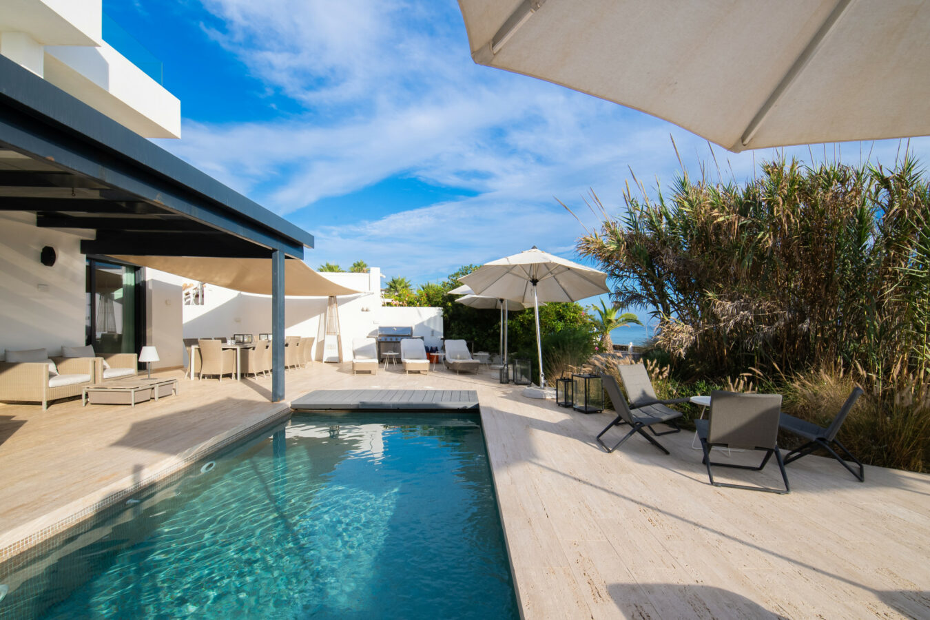 FOR SALE 🏡 Beachfront Villa with Direct Sand Access and Rooftop Wellness Deck – Costabella, Marbella