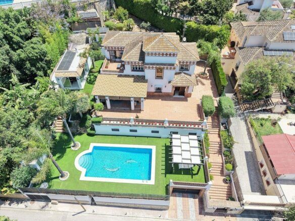 Spacious south-west facing villa with pool steps from the beach in Elviria, Marbella