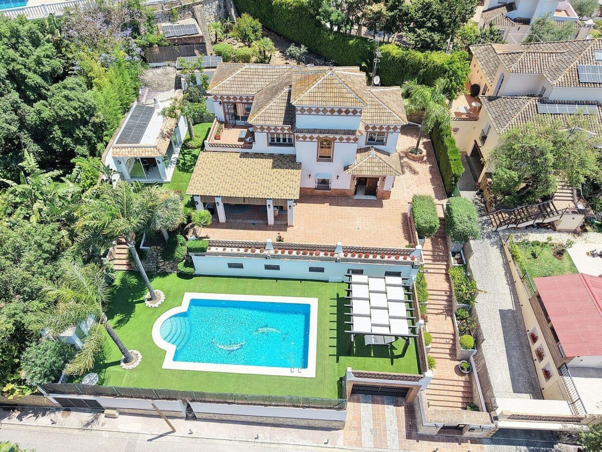 Spacious south-west facing villa with pool steps from the beach in Elviria, Marbella
