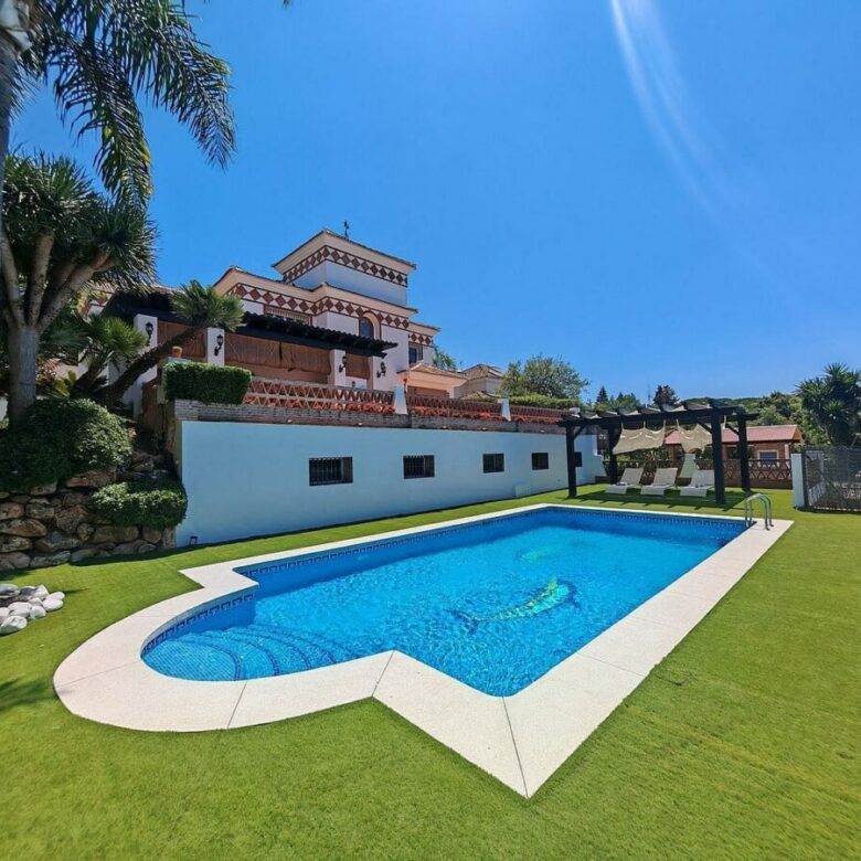 Spacious south-west facing villa with pool steps from the beach in Elviria, Marbella