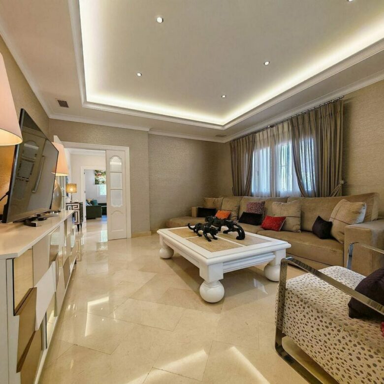 Spacious south-west facing villa with pool steps from the beach in Elviria, Marbella