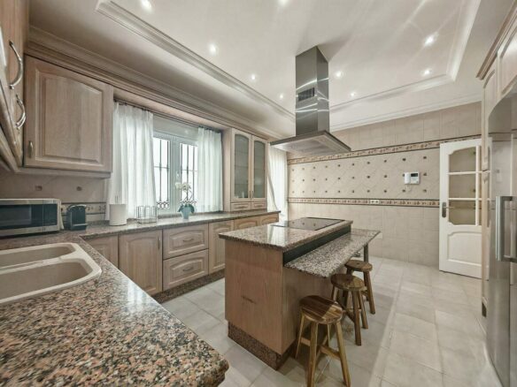 Spacious south-west facing villa with pool steps from the beach in Elviria, Marbella