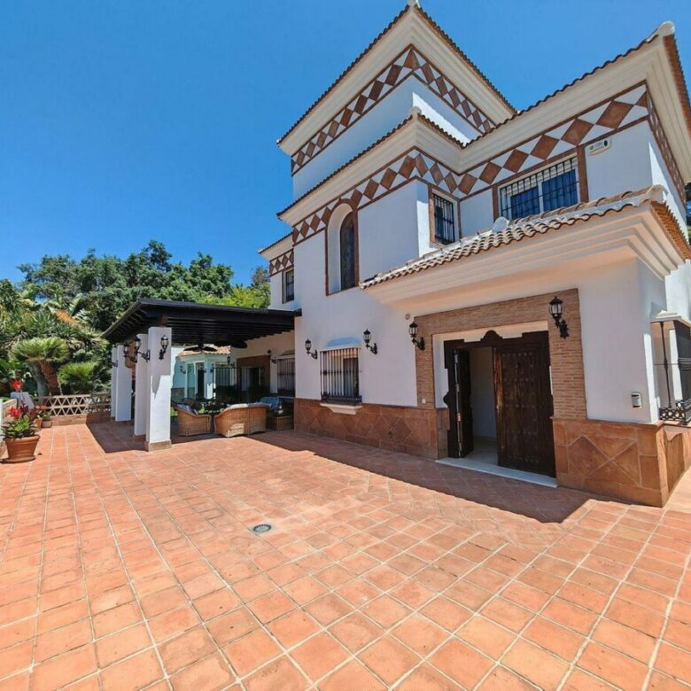 Spacious south-west facing villa with pool steps from the beach in Elviria, Marbella