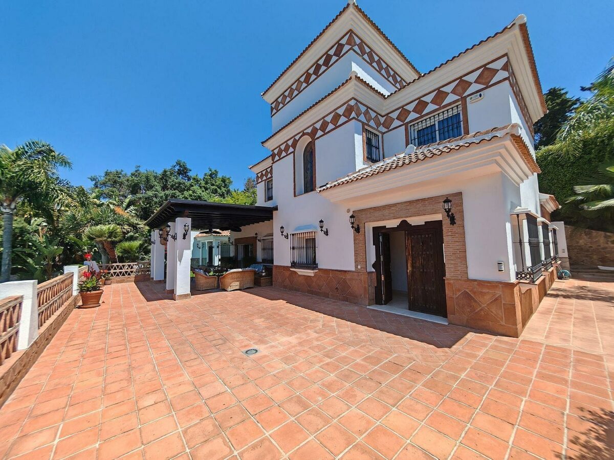 Spacious south-west facing villa with pool steps from the beach in Elviria, Marbella
