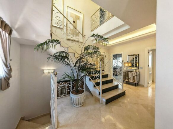 Spacious south-west facing villa with pool steps from the beach in Elviria, Marbella