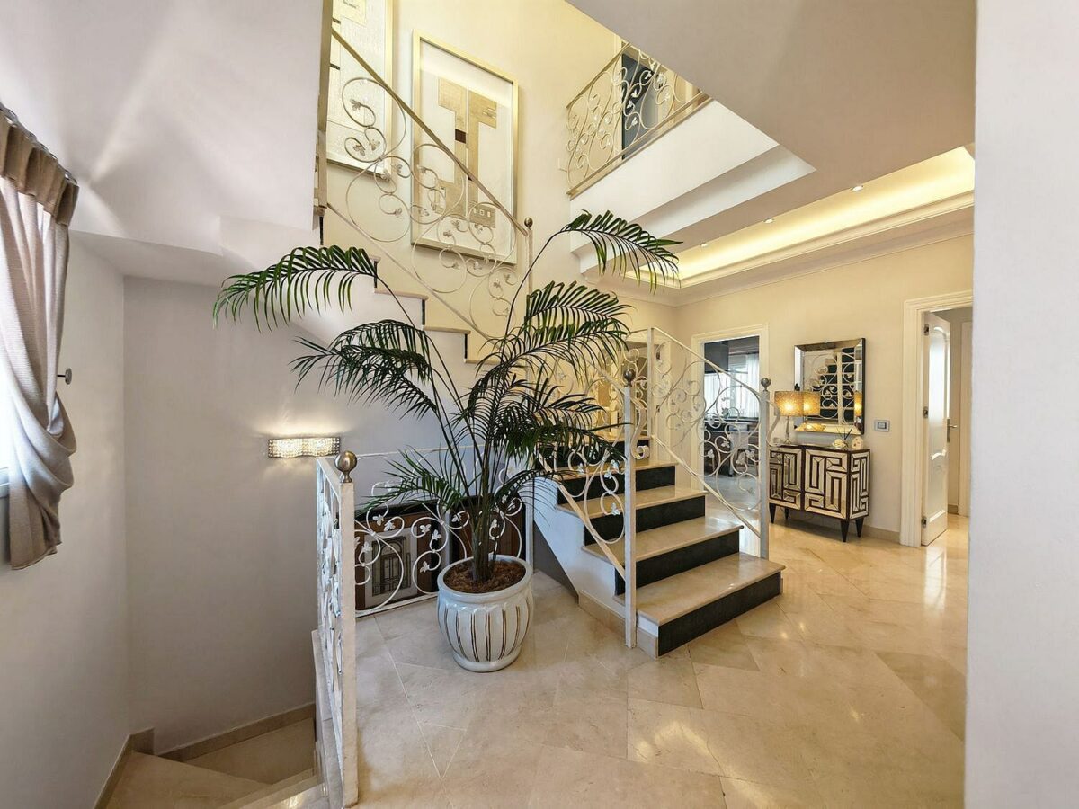 Spacious south-west facing villa with pool steps from the beach in Elviria, Marbella