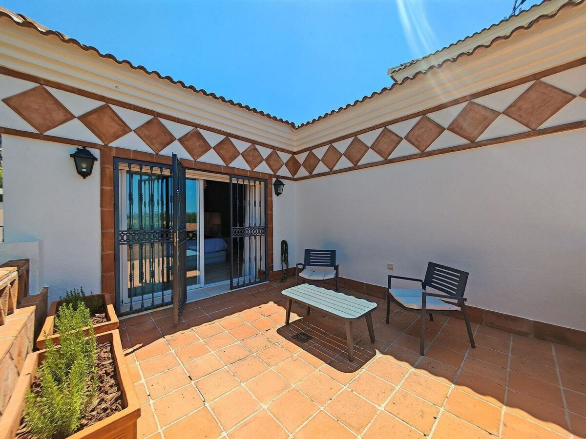 Spacious south-west facing villa with pool steps from the beach in Elviria, Marbella