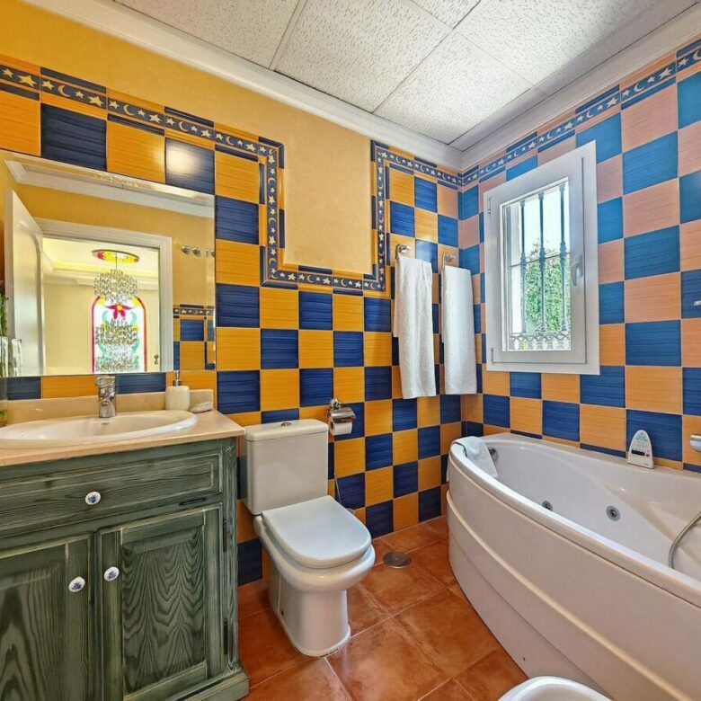 Spacious south-west facing villa with pool steps from the beach in Elviria, Marbella