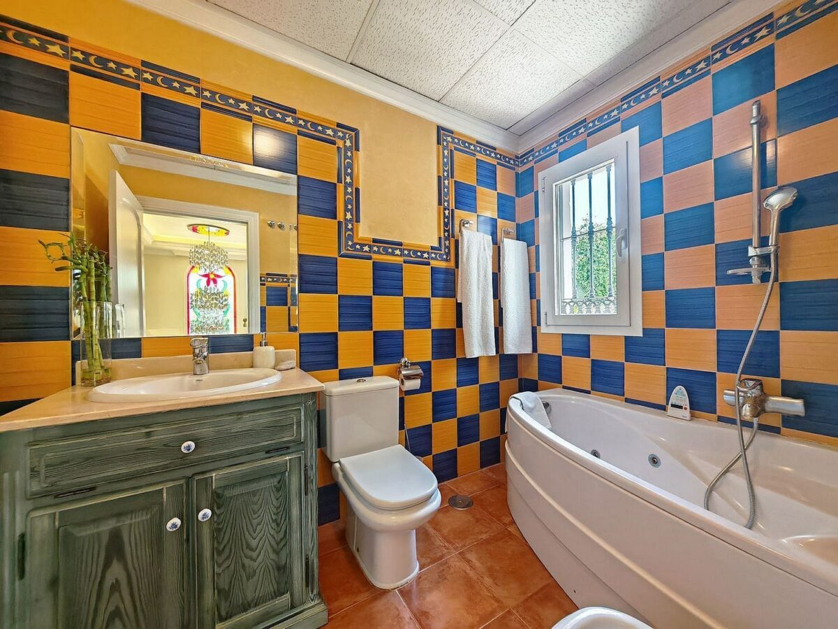 Spacious south-west facing villa with pool steps from the beach in Elviria, Marbella