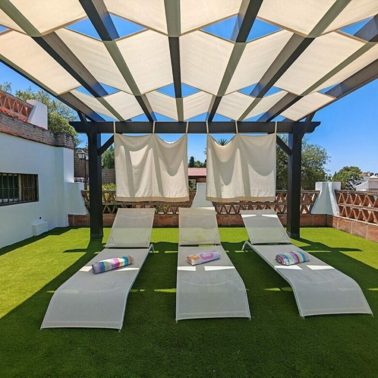 Spacious south-west facing villa with pool steps from the beach in Elviria, Marbella