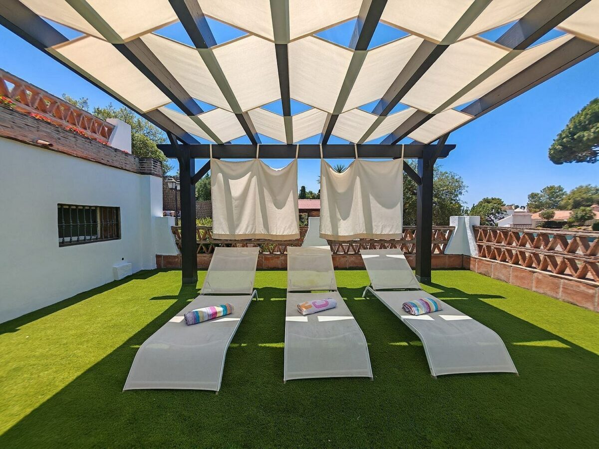 Spacious south-west facing villa with pool steps from the beach in Elviria, Marbella