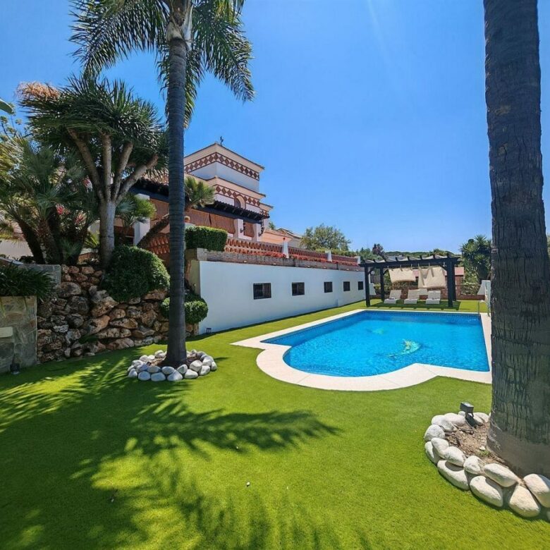 Spacious south-west facing villa with pool steps from the beach in Elviria, Marbella