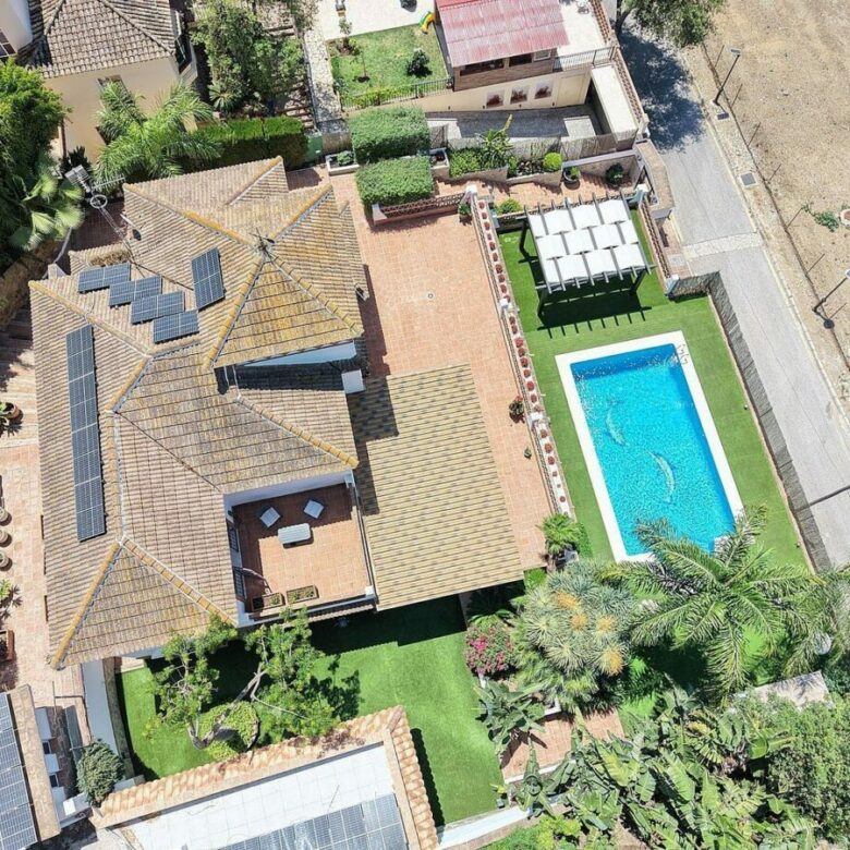 Spacious south-west facing villa with pool steps from the beach in Elviria, Marbella