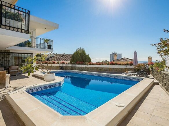 Elevated villa with panoramic sea and golf views in Nueva Andalucia, Marbella