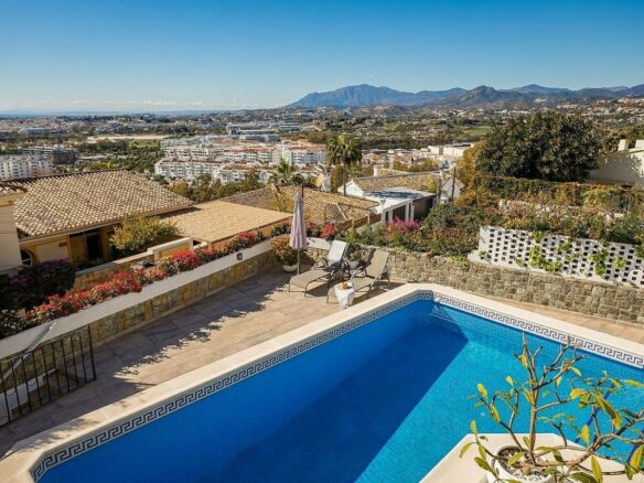 Elevated villa with panoramic sea and golf views in Nueva Andalucia, Marbella