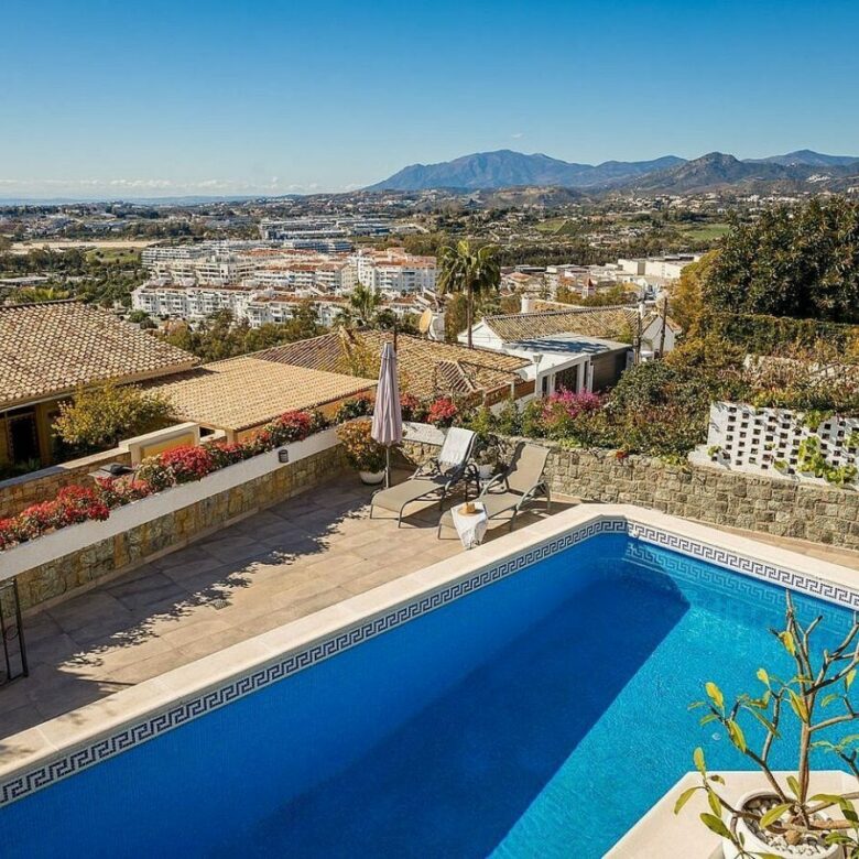 Elevated villa with panoramic sea and golf views in Nueva Andalucia, Marbella