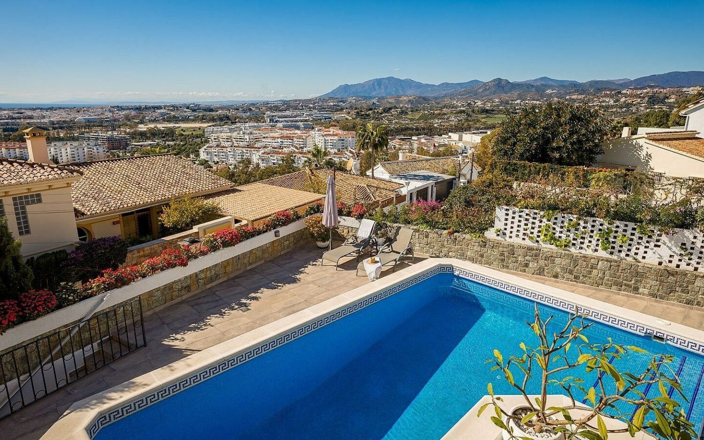 Elevated villa with panoramic sea and golf views in Nueva Andalucia, Marbella