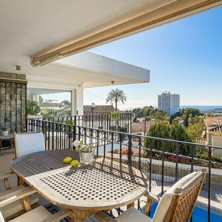 Elevated villa with panoramic sea and golf views in Nueva Andalucia, Marbella