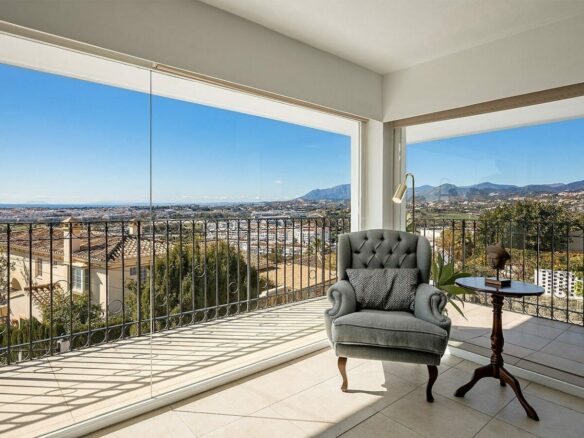 Elevated villa with panoramic sea and golf views in Nueva Andalucia, Marbella