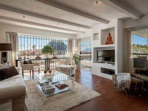 Elevated villa with panoramic sea and golf views in Nueva Andalucia, Marbella