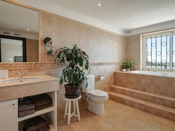 Elevated villa with panoramic sea and golf views in Nueva Andalucia, Marbella
