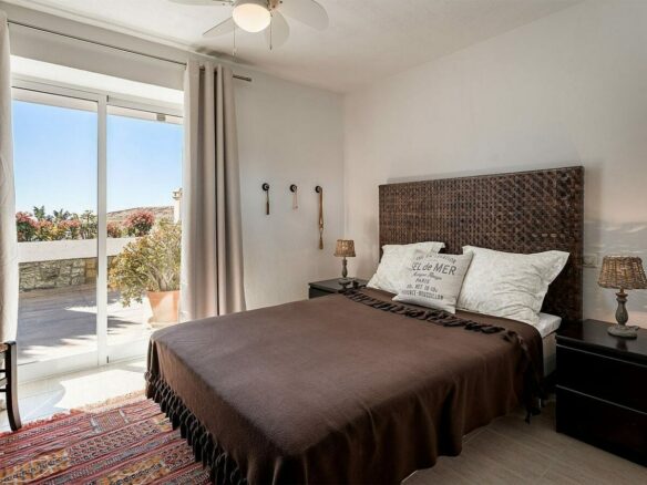Elevated villa with panoramic sea and golf views in Nueva Andalucia, Marbella