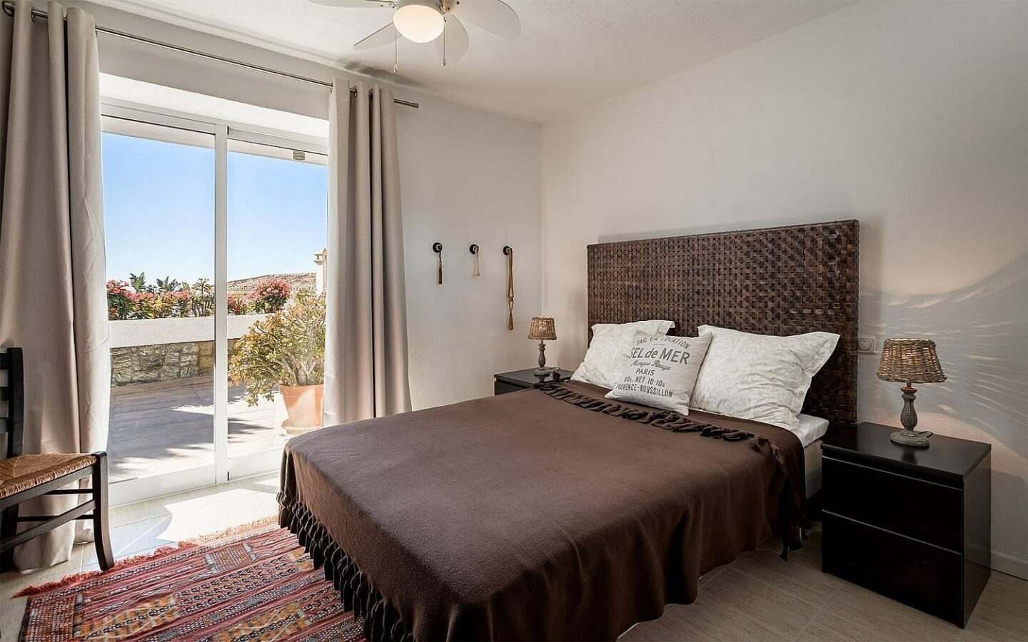 Elevated villa with panoramic sea and golf views in Nueva Andalucia, Marbella