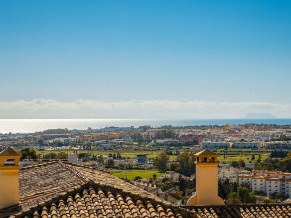Elevated villa with panoramic sea and golf views in Nueva Andalucia, Marbella