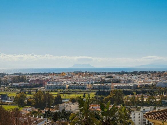 Elevated villa with panoramic sea and golf views in Nueva Andalucia, Marbella