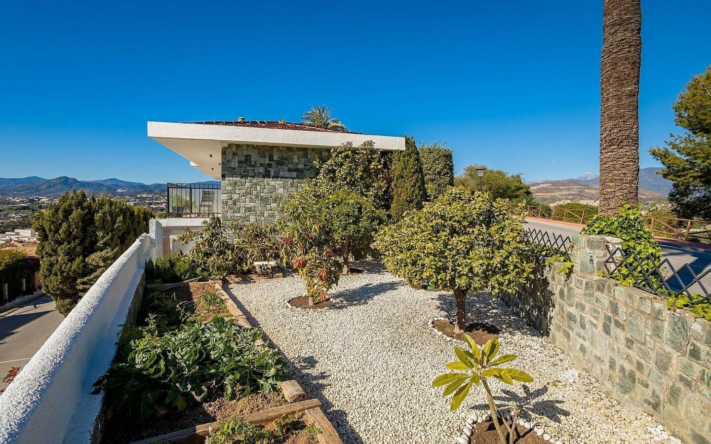 Elevated villa with panoramic sea and golf views in Nueva Andalucia, Marbella