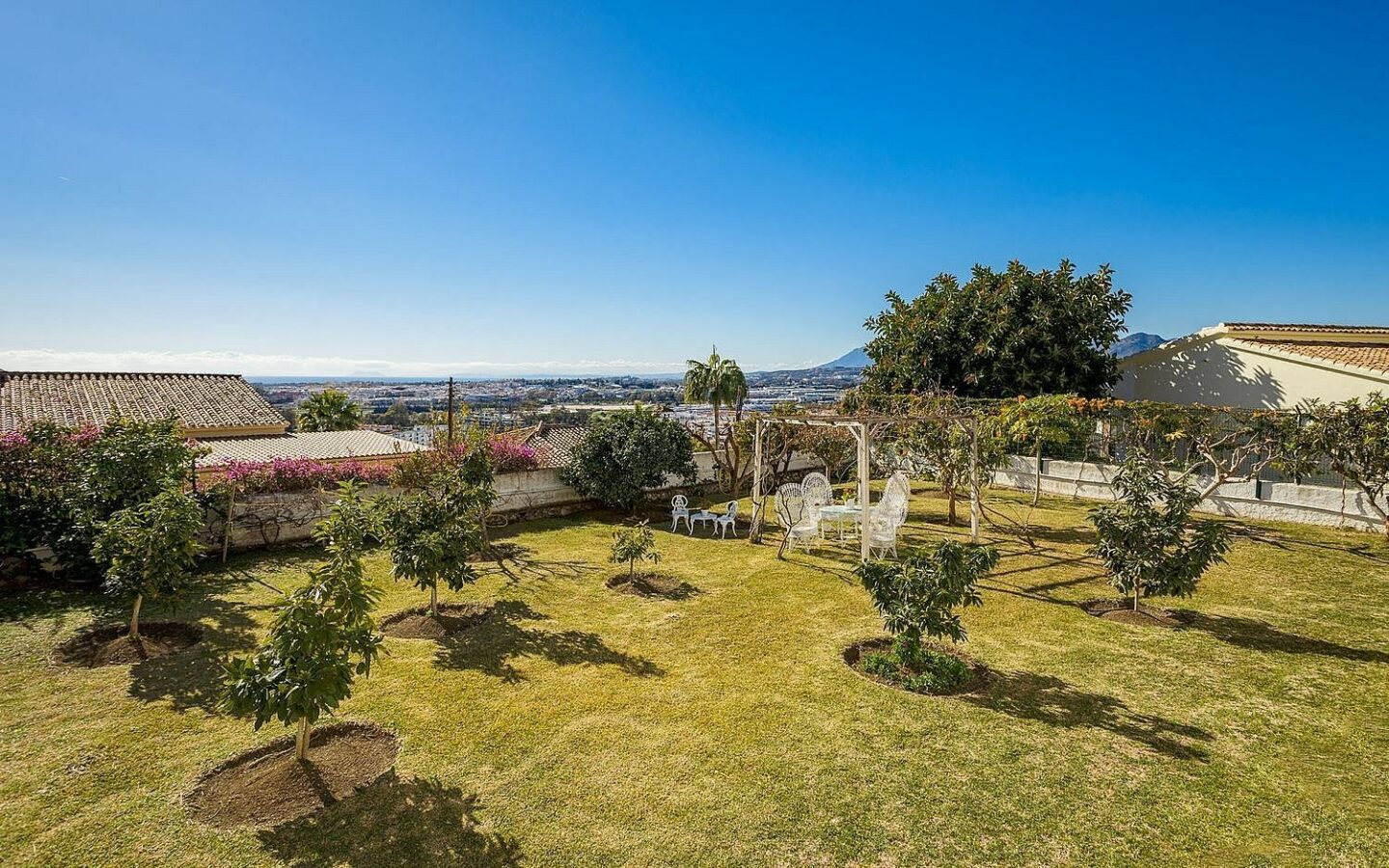 Elevated villa with panoramic sea and golf views in Nueva Andalucia, Marbella