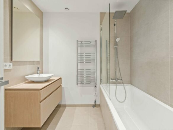 Bathroom with bathtub and shower