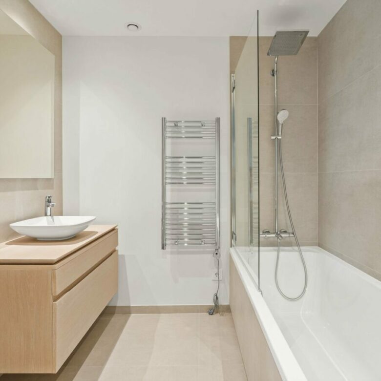 Bathroom with bathtub and shower