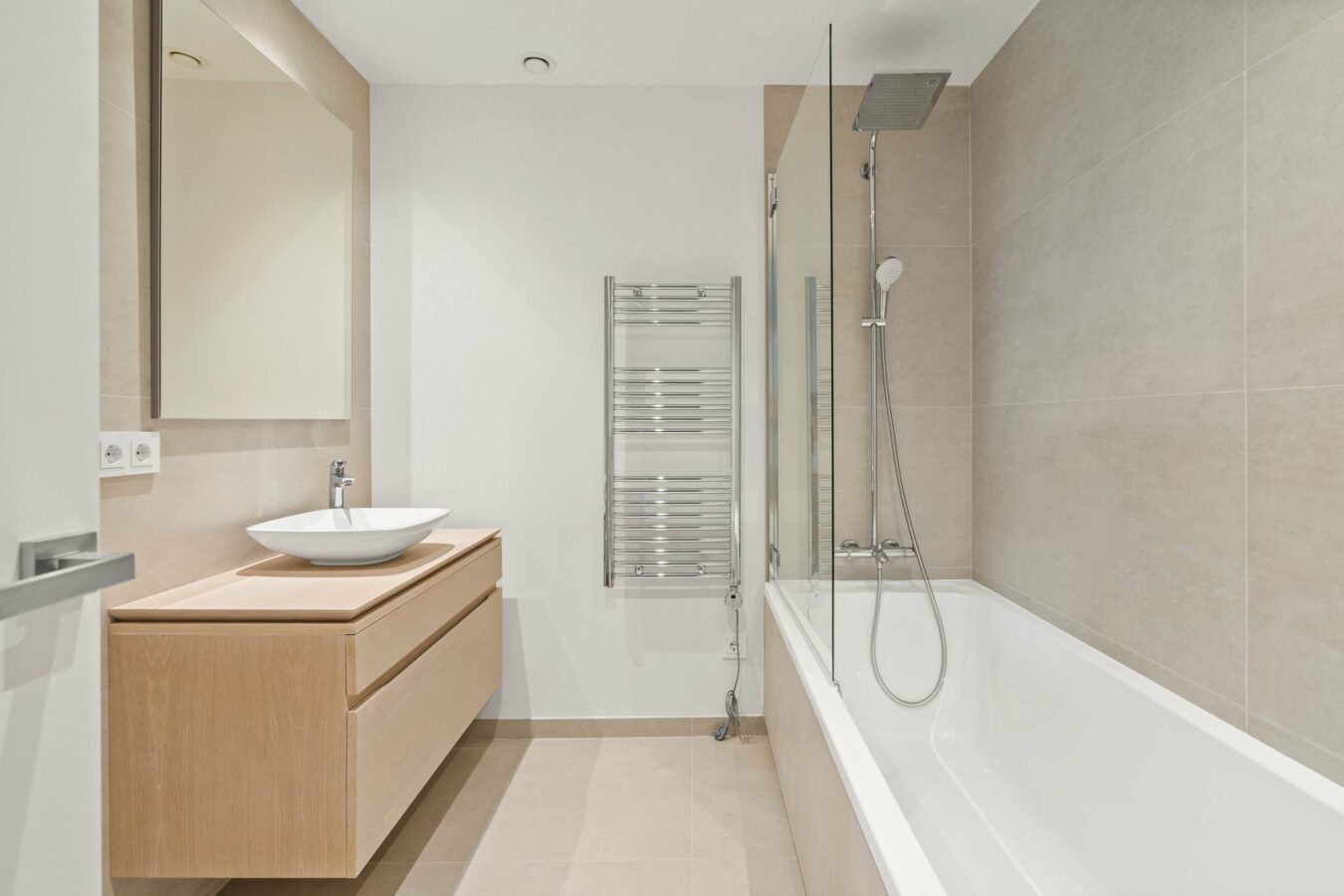 Bathroom with bathtub and shower