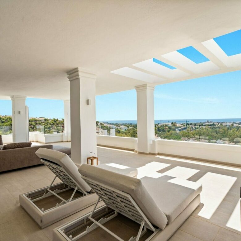 Terrace with sun loungers and skylights