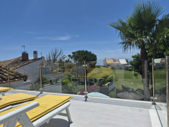FOR SALE 🏡 Beachside Three-Bedroom Villa with Two Roof Terraces in a Gated Resort Community – Bahía Dorada, Estepona 🇪🇸